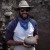 Student holding a prehistoric seed jar he had just excavated at the Fornholt site in west-central New Mexico.