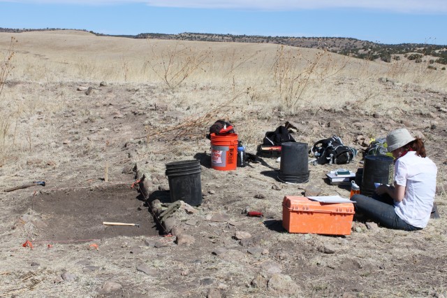 Emily taking notes Emily (Rutgers University) taking notes about what is being found in the unit. Photo by Dan Weinberger.