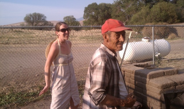 Juan and Lizzie Our cook consults with Juan for some open fire cooking tips.