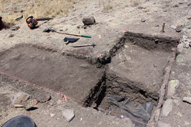 Active excavation into the large central depression in Fornholt's southern room block.