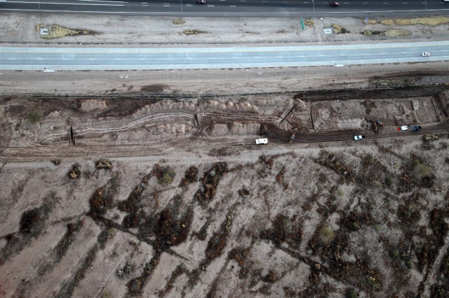 Aerial view of the Rillito Fan canal as it parallels Interstate 10 and the Santa Cruz River near Tucson, Arizona. Canal aerial courtesy of Northland Research, photographer Henry D. Wallace. Fieldwork sponsored by Pima County.