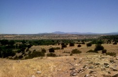 The central Chuska Valley. View from a Pueblo III mesa-top fortress known as The Gap, looking west toward the Chuska Mountains, 1998. Click to enlarge.