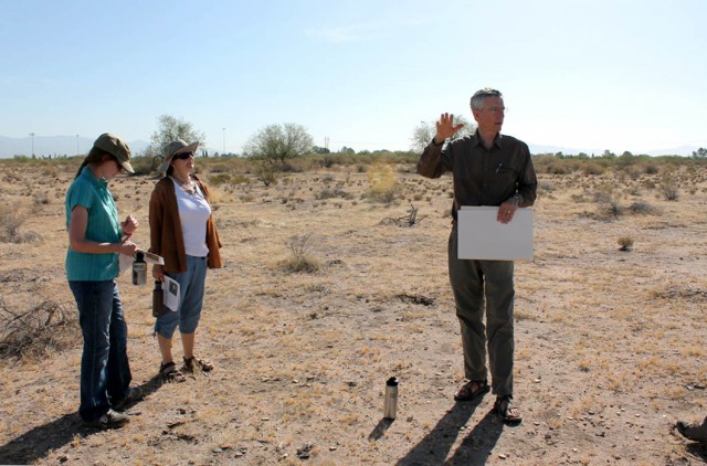 Bill explains the features of the Valencia site while Katherine Dungan (far left) and Deb Huntley listen attentively.