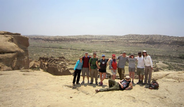 Field school students posing in front of the spectacular view at the Pueblo Bonito Overlook.