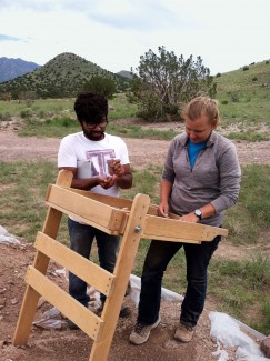 Student Ali Mendha and staff member Elizabeth Jaroszewski screen for artifacts near the south room block. Click to enlarge.