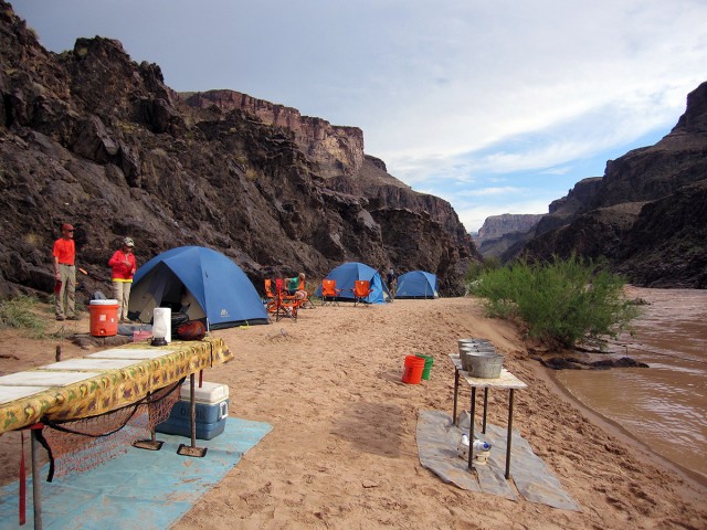 Drop cloths catch any crumbs from food preparation–a requirement for commercial river runners. The result is clean beaches.