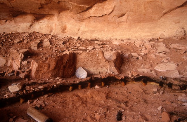 A burned Basketmaker III pithouse at Broken Flute Cave, Arizona. Photo by Paul Reed.