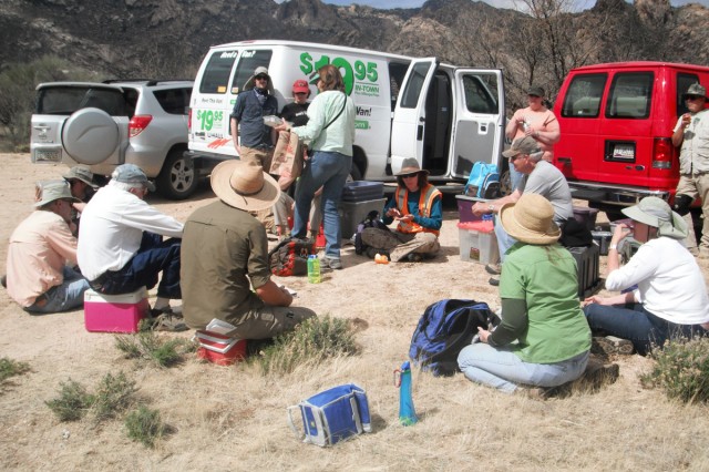 Lunches are a community affair and usually involve decent food, dirty fingers, and great people. This weekend, someone even brought homemade brownies. Photo by Steve Cox.