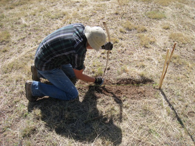 Using digging sticks to dig the foundation trenches of an adobe pueblo is slow and labor-intensive.