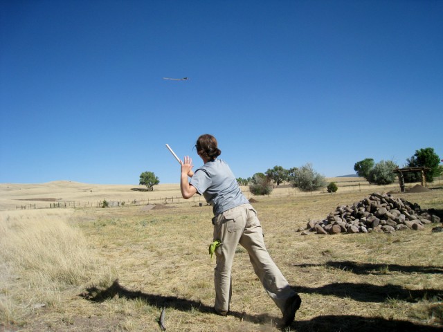 Kaelyn sends a dart flying high into the New Mexico sky. Photo by Allen Denoyer.