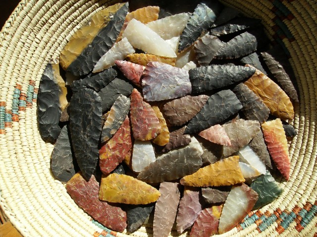Basket of replica projectile points.