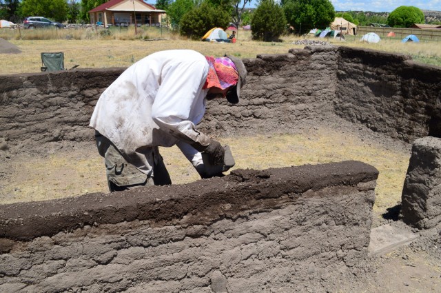 Allen building the experimental adobe wall. Photo by Jacqueline Fox.