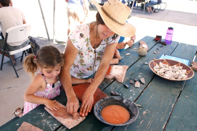 Making jewelry at the 2014 Archaeology Fair