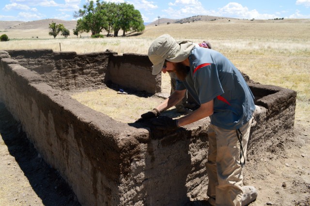 Max working on the wall. Photo by Jacqueline Fox.