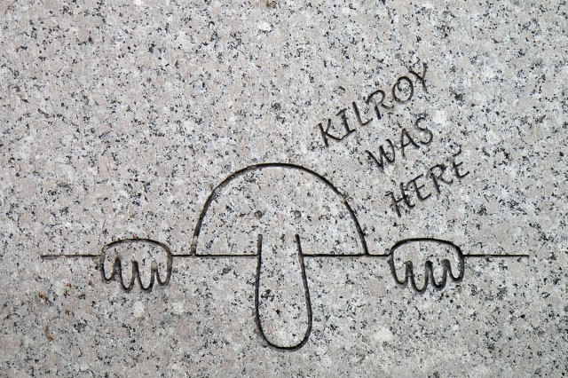 “Kilroy Was Here – Washington DC WWII Memorial” by Luis Rubio from Alexandria, VA, USA – Kilroy was here. Licensed under Creative Commons Attribution 2.0 via <a href="http://commons.wikimedia.org/wiki/File:Kilroy_Was_Here_-_Washington_DC_WWII_Memorial.jpg#mediaviewer/File:Kilroy_Was_Here_-_Washington_DC_WWII_Memorial.jpg">Wikimedia Commons</a>.