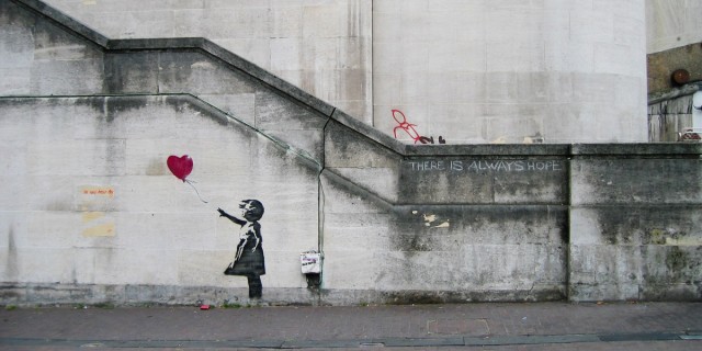 Girl with a Heart-Shaped Balloon, painting by <a href="http://banksy.co.uk/out.asp">Banksy</a>.