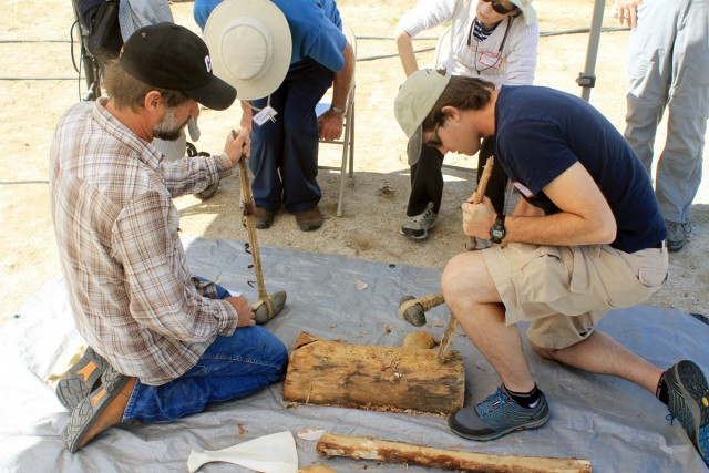 Allen encourages members to try their hand at swinging a replica axe.
