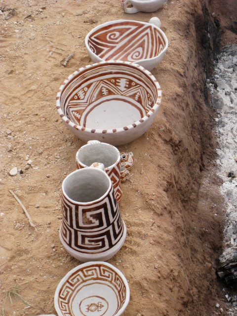 Pots prior to firing. Mine are the two bowls at the top.