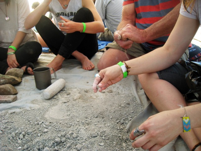 Processing clay with our hands.