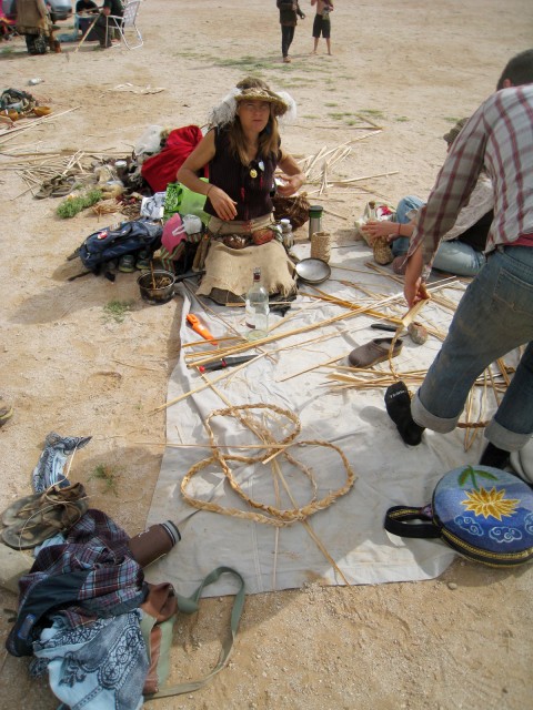 Cattail weaving. This woman makes woven hats.