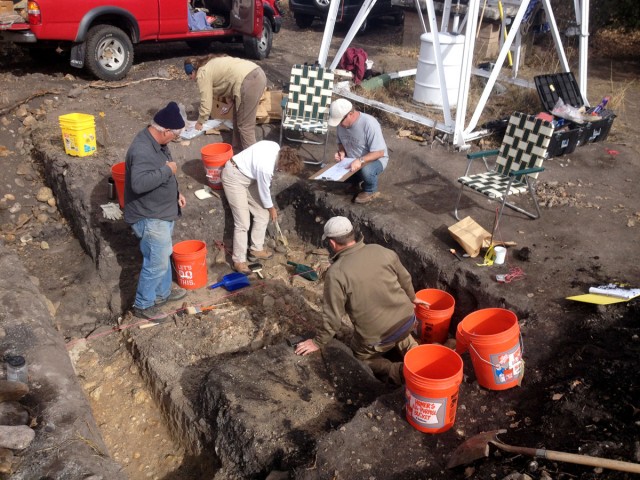 Later phase of the Desperation Ranch excavations. Clockwise from left: Bill Gillespie (knit cap), Mary Prasciunas (blue headband), Jenny Adams (white shirt), Jonathan Mabry (with clipboard), and Jesse Ballenger (at buckets). Photo by Allen Denoyer.