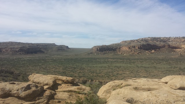 From the overlook above Pueblo Bonito, looking through the   South Gap, down Chaco's South road.