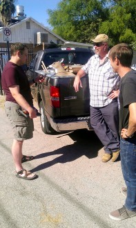 Loading equipment into the trucks before leaving Tucson. Our foam deer target is once again ready for action! From left to right: Matt Peeples, Will Russell, Aaron Wright. Photo by Leslie Aragon.