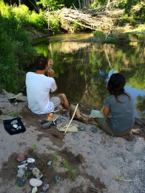 Allen and Monica carving atlatls near the San Francisco Hot Springs.