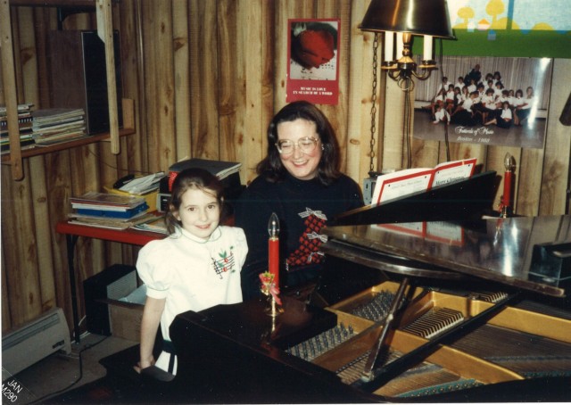 Learning how to play the piano from my mother.