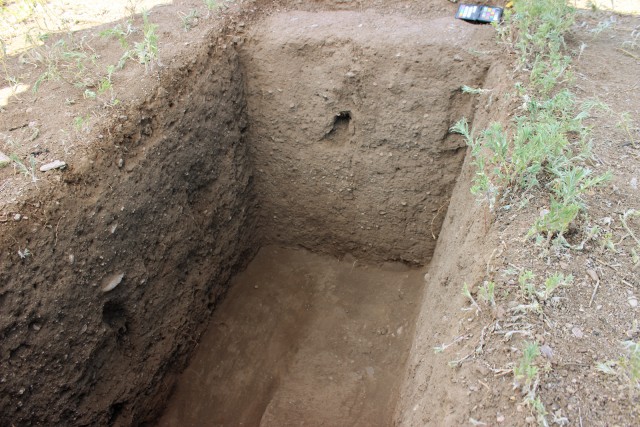 Our first exploratory trench in Feature 300 Unit 300 allowed us to locate the room’s adobe floor.
