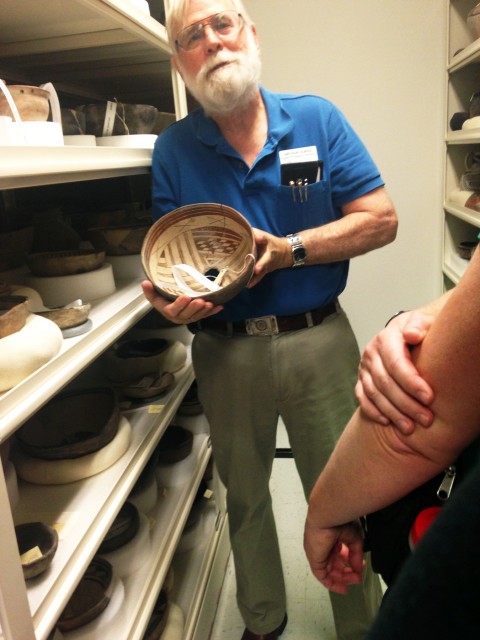 Arthur Vokes showing a Mimbres bowl with kill hole during our visit to the Arizona State Museum.