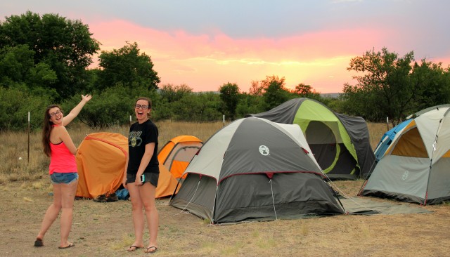 Katie C. and Emily enjoy the sunset over our campsite.