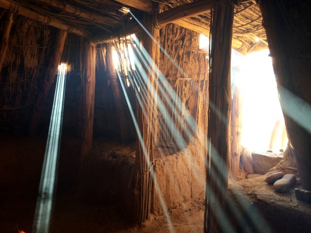 Inside the replica pithouse.