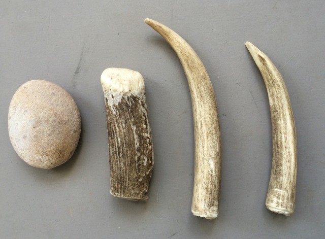 Flint-knapping tools: a. worked antler pressure flaker; b-e