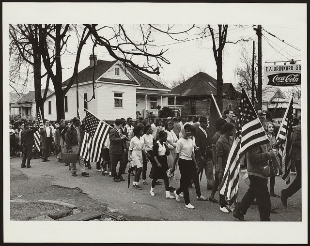 Participants, some carrying American flags, marching in the civil rights march from Selma to Montgomery, Alabama in 1965. Photo by Peter Pettus, courtesy of the Library of Congress. Click to enlarge.
