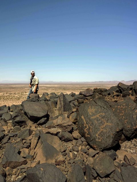 Aaron surveying the rock art at the Fleming parcel.