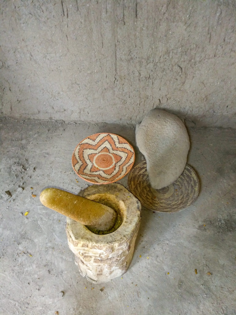 Mortar and pestle setup inside the adobe room. Image: Zaynab Chamalian