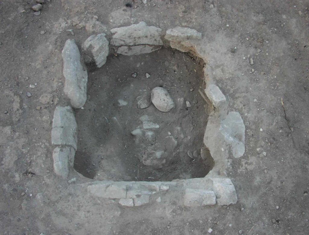 This hearth in the eastern Mimbres area is partially lined with unshaped cobbles, one of several shapes of hearth farmers here made between 1000 and 1130 CE.