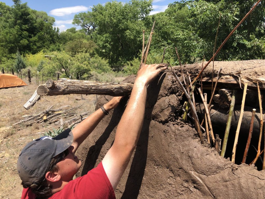 Chris mudding Jacal wall