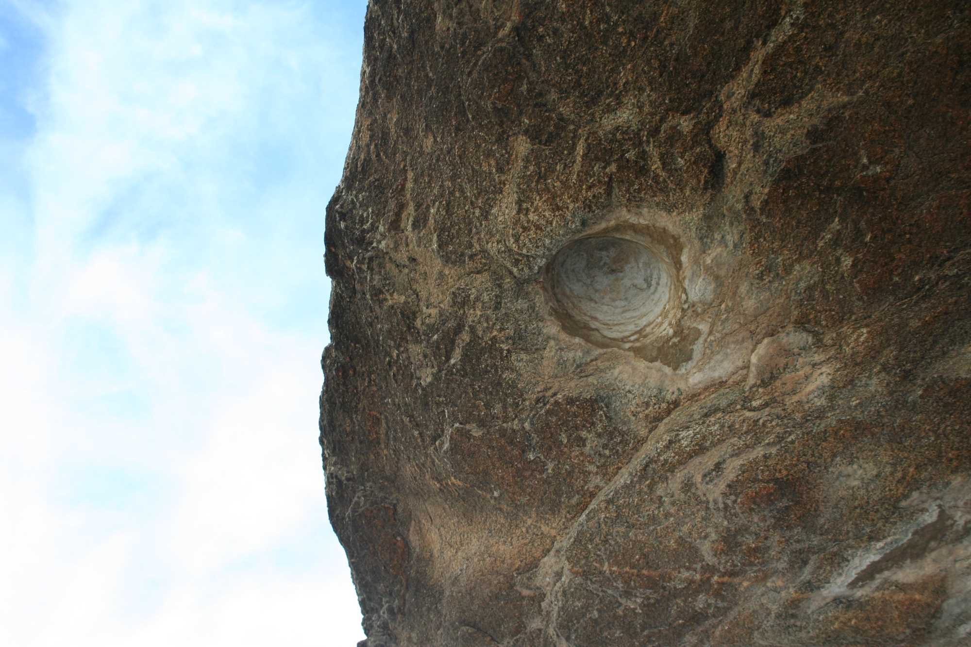 A large cupule ground into the ceiling of an overhang, above a spring in the South Mountains, Phoenix. Is this “art”?