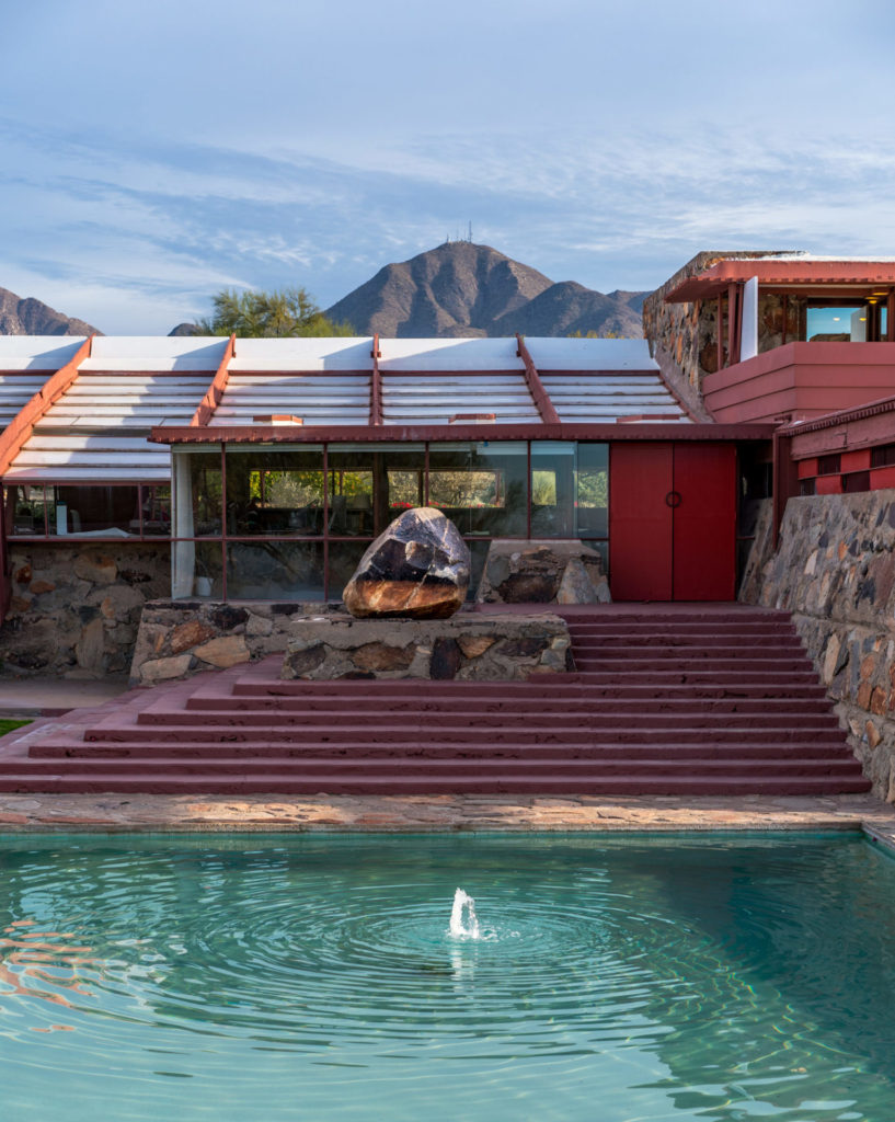 View over the original entrance to Taliesin West with a prominent petroglyph-covered boulder propped above the reflecting pool. The boulders sits like an effigy of Thompson Peak towering in the background. Image: Paul Vanderveen