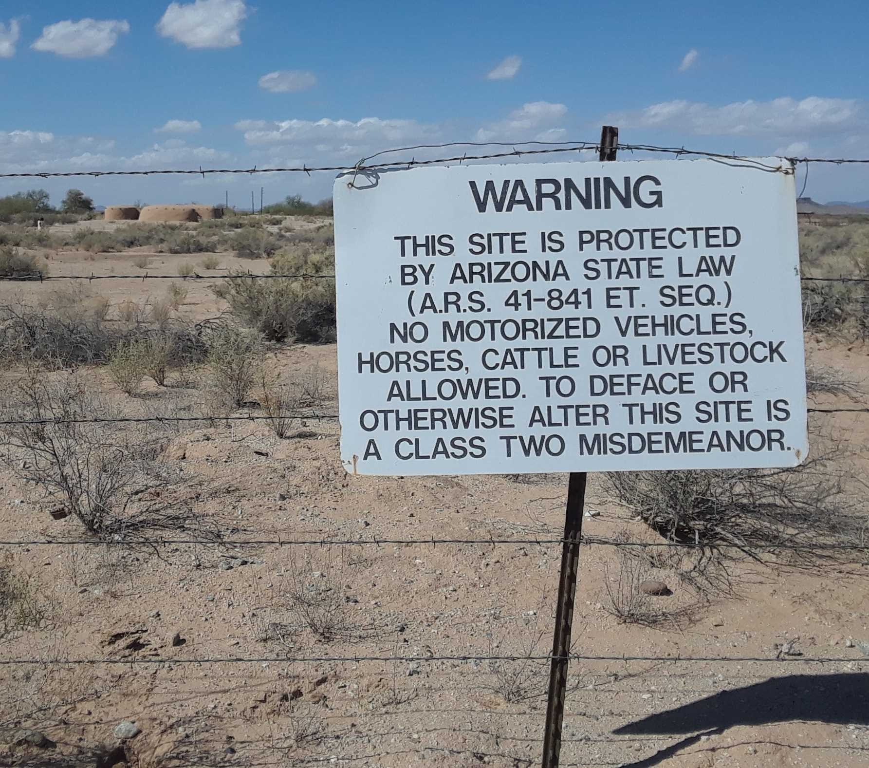 Sign and fence at the Gatlin site, Gila Bend AZ. Image: J.R. Welch