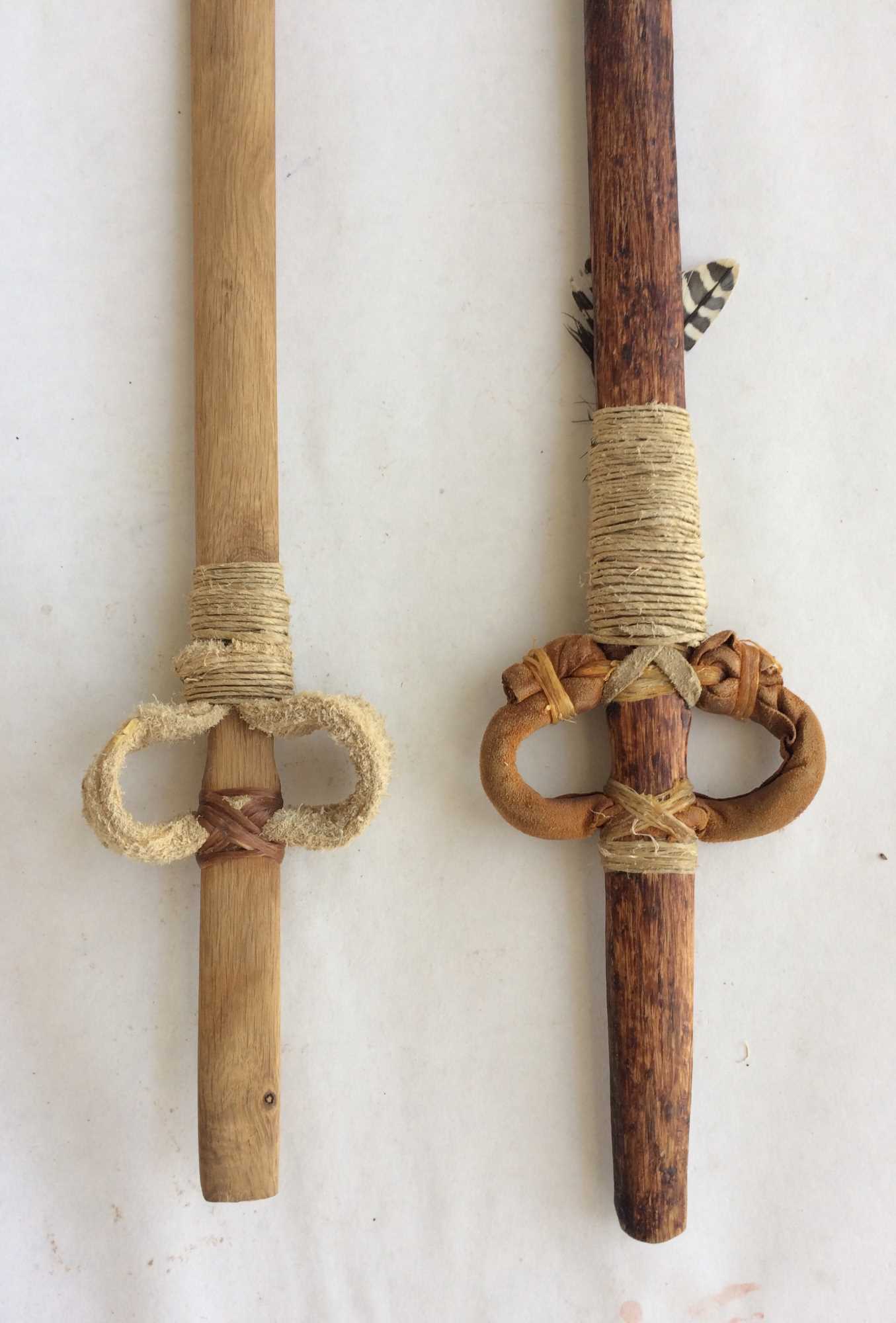 This style of atlatl, with leather loops, is known as the Basketmaker style. It is known from many examples found in rock shelters on the Colorado Plateau. These are replicas.