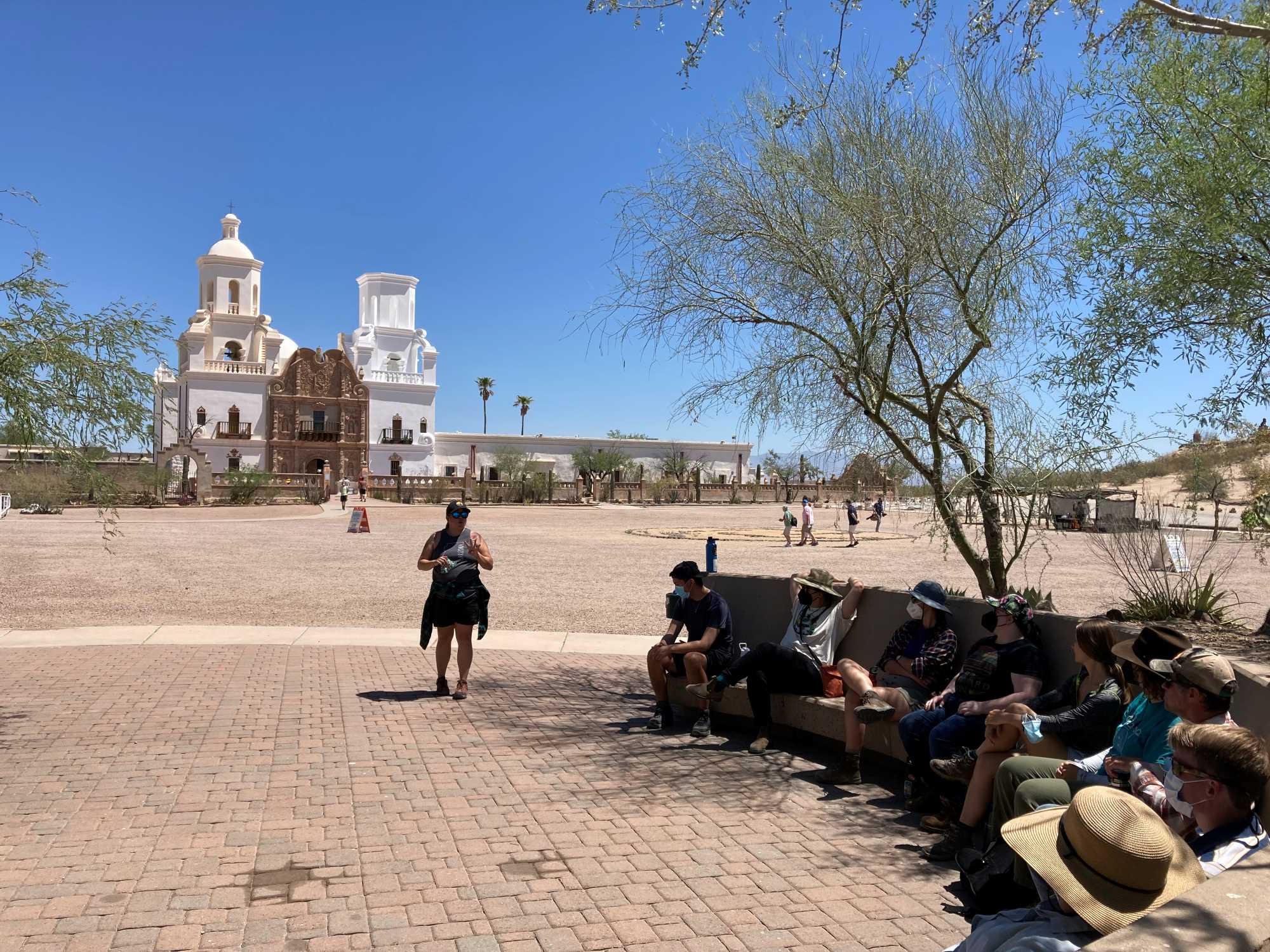 Jacelle Ramon-Sauberan (Tohono O’odham Community College) introduces our group to the history of San Xavier del Bac, the community where she grew up and continues to work researching the history of land and water use.