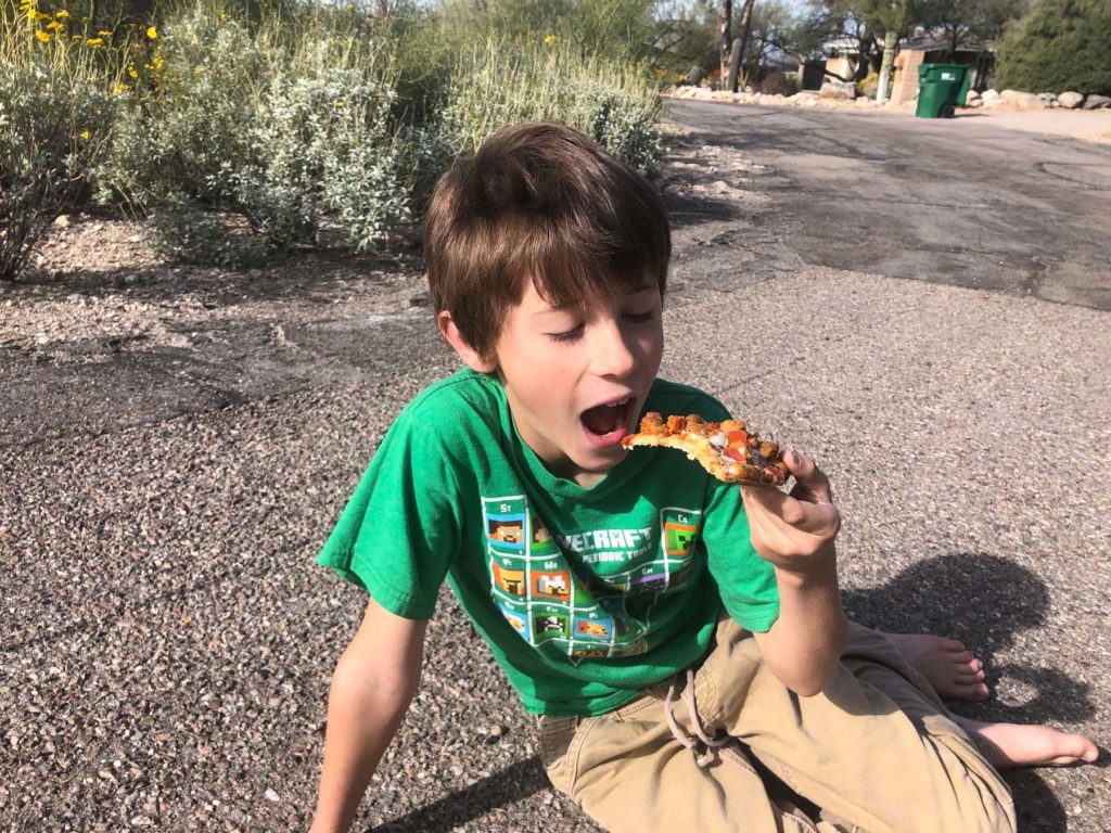 Enjoying the pizza