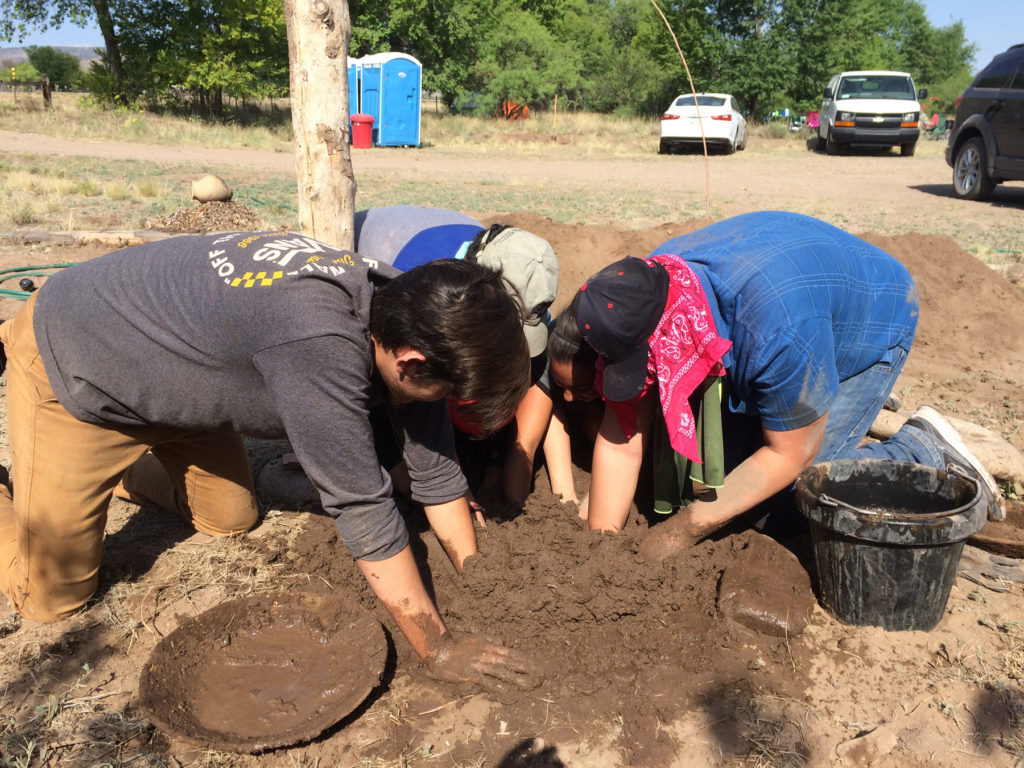 Students Mixing Mud