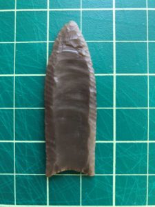 In this example, you can see how delicate the margin retouch can be. This is a cast I purchased from the Lithic Casting Lab. The original point is complete and doesn’t look like it was ever used.