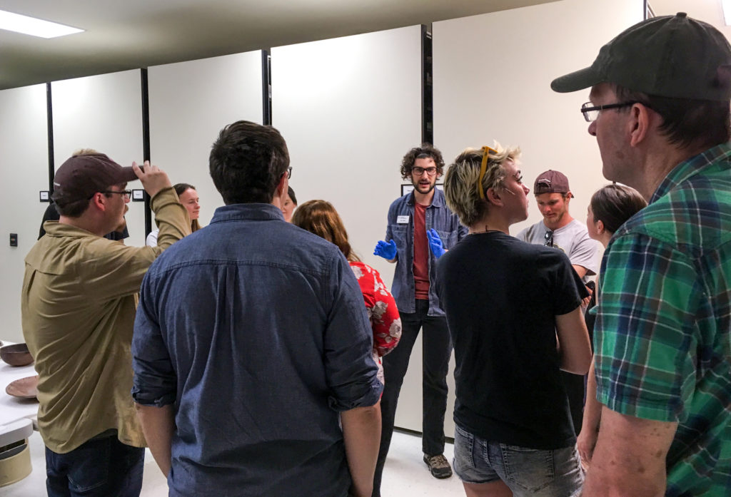 Riley Duke speaking to field school students about pottery at the Arizona State Museum. Image: Karen Schollmeyer