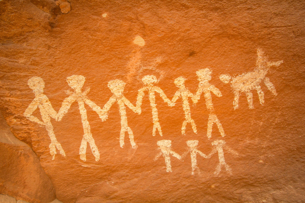 These Basketmaker pictographs display rows of people joined by hand. © Jonathan Bailey