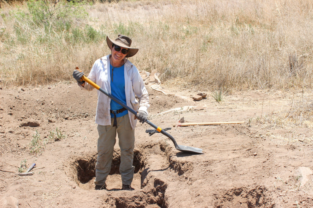 Our fearless leader, Karen Schollmeyer, happily exposing adobe walls in a shallow trench. Finding walls makes me happy, too!